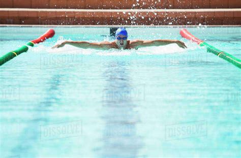 Swimmer Racing In Pool Stock Photo Dissolve