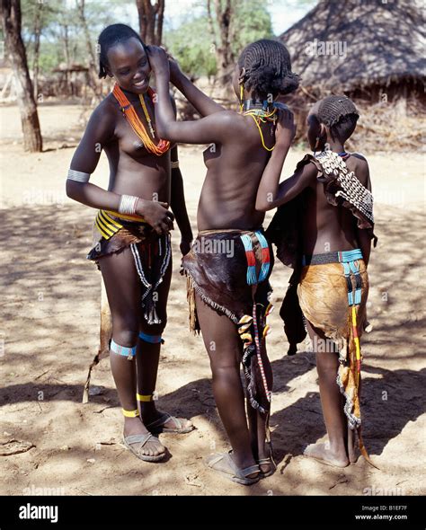 Girls Of The Tsemay Tribe Of Remote Southwest Ethiopia Wear Attractively Decorated Leather