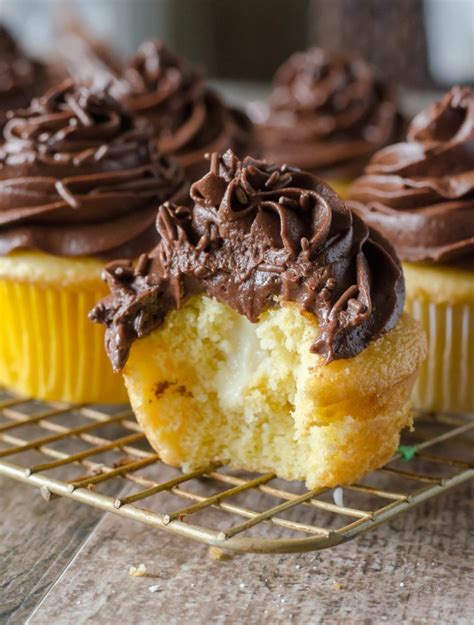Spread 1 tablespoon vanilla cream on each cupcake bottom. Boston Cream Cupcakes Go Go Go Gourmet