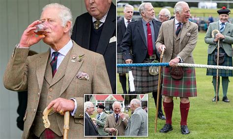 Prince Charles Enjoys A Glass Of Whisky As He Watches The Grampian Highland Games In Scotland