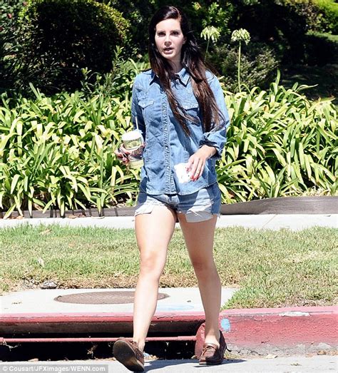 Lana Del Rey Misses The Mark In Dated Double Denim As She Flashes Her Long Limbs In Tiny Hot