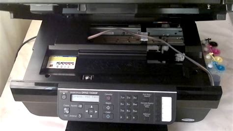A printer's ink pad is at the end of its service life. Epson TX300F - YouTube