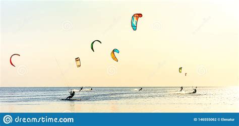 Kite Surfing And A Lot Of Silhouettes Of Kites In The Sky Holidays On