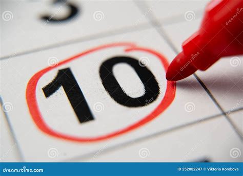The Calendar 10th Day Of The Month Is Circled A Red Marker Circles The