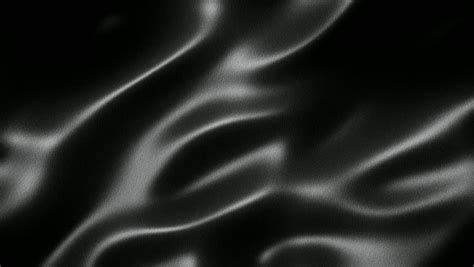 A Background Texture Of Soft Rippled Black Fabric Textile Material