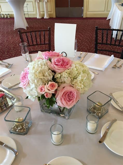 White Hydrangea Pink Garden Roses And Pink Spray Roses In Glass Cube