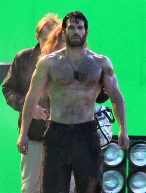 A Shirtless Henry Cavill Shows Off His Abs Of Steel As Superman Henry