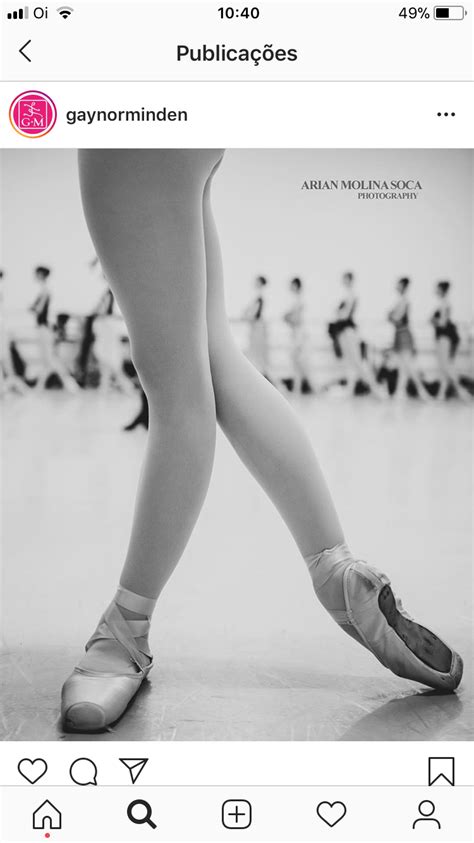 A Person In Ballet Shoes Standing On The Floor