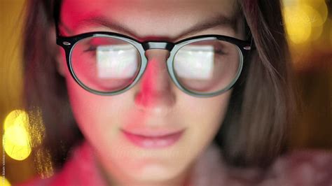 woman with glasses looking at the monitor by stocksy contributor nikita sursin stocksy