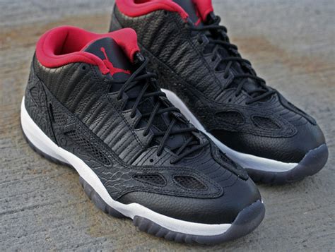 Explore and buy the air jordan 11 retro low ie 'obsidian'. Air Jordan 11 Low IE Black True Red 2015 - Sneaker Bar Detroit