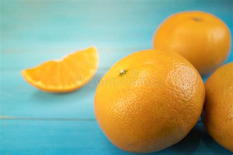 Oranges Close Up Whole Orange Fruits And Sliced Orange On Wood Stock