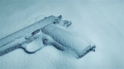 Gun In The Snow Moving Shot Stock Footage Videohive