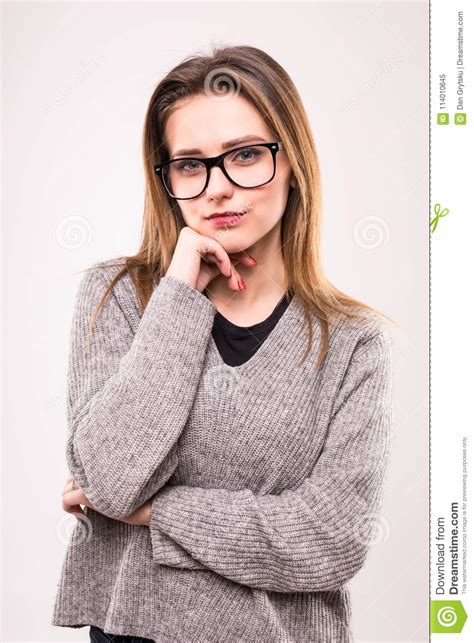 Smiling Brunette Woman In Eyeglasses Posing And Looking At The Camera