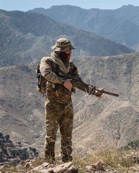 A Us Army Green Beret Stands On A Ridge In Achin District Nangarhar