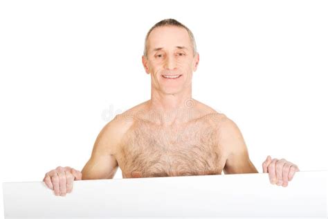 Happy Mature Shirtless Man Holding Empty Banner Stock Photo Image Of Blank Male