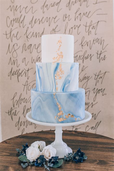 Blue And White Marble Fondant Wedding Cake With Gold Leaf Design And