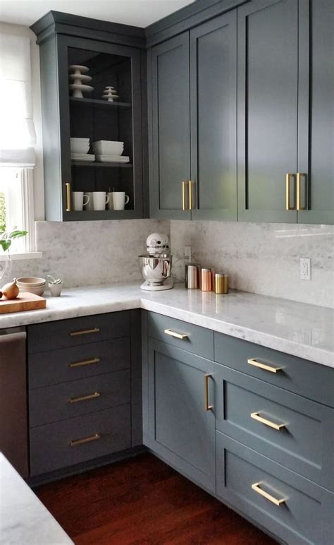 Dark Grey Shaker Cabinets With Gold Hardware Pulls And Marble
