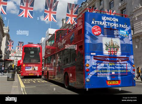 The Rear Of A London Tour Bus Featuring An Illustration Of Tourist