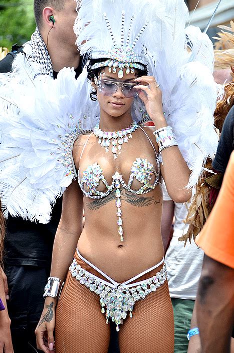 Rihanna Risks Nip Slip In Bejeweled Bikini Drinks During The Day Us Weekly