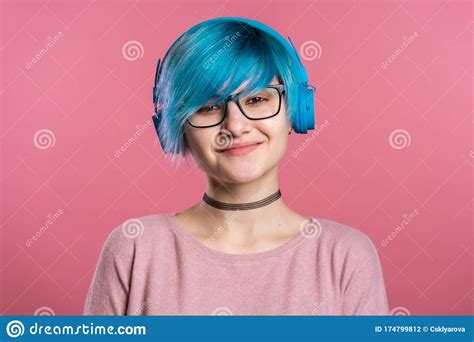 Pretty Girl With Turquoise Hair Having Fun Smilingdancing With Blue