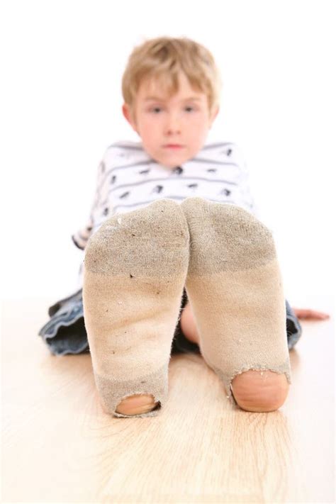 Boy Wearing Dirty Socks With Holes In Them Stock Photo Image Of Dirty