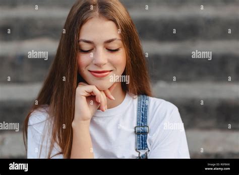 Closup Portrait Of Young Pretty Girl Sitting On Stairs Stock Photo Alamy