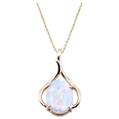 Natural Opal Pendant Set In 14 Karat Yellow Gold For Sale At 1stDibs