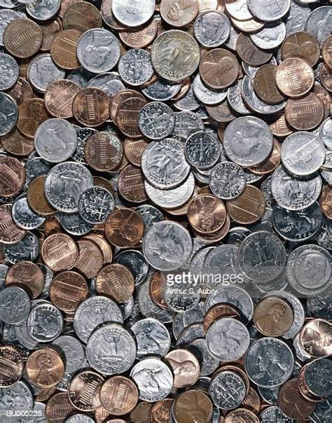 Penny Nickel Dime Quarter Photos And Premium High Res Pictures Getty