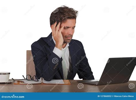 Young Sad And Depressed Business Man Working Overwhelmed And Frustrated
