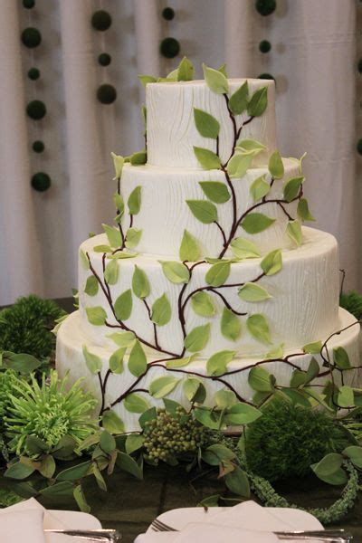 Whether your outdoor wedding is at a cabin, in the woods, or by the lake, use this earthy color palette of emerald sea, malachite, glacier blue and ashwood brown to paint your dream day. Nature themed cake | Wedding Ideas | Pinterest