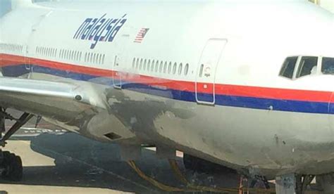 Malaysia airlines flight 17 (mh17/mas17) was a scheduled passenger flight from amsterdam to kuala lumpur that was shot down on 17 july 2014 while flying over eastern ukraine. MH17 crash: Confusion over viral photo | Stuff.co.nz