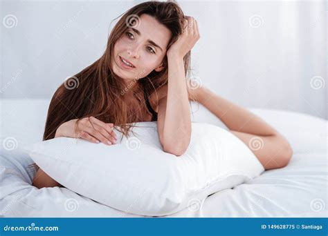 Young Woman Wearing Bikini Enjoying Her Summer Holidays Relaxing On The Beach Bed Stock Image