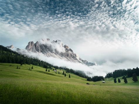 Download Wallpaper 1400x1050 Dolomites Mountains Cloudy Sky And