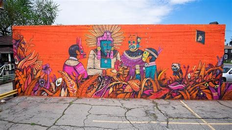 Saner Paints A New Mural During His Art Residency In Detroit With