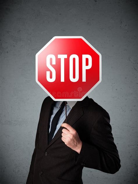 Businessman Holding A Stop Sign Stock Photo Image Of Expression