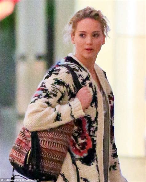 Jennifer Lawrence Stays Warm In A Bulky Bohemian Cardigan As She Jets