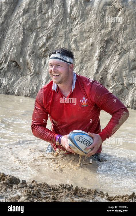 A Competitor Dressed As A Wales Rugby Player On The ‘mud Mile At The
