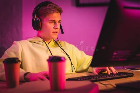 Concentrated Young Gamer In Headset Play Stock Image Image Of Online