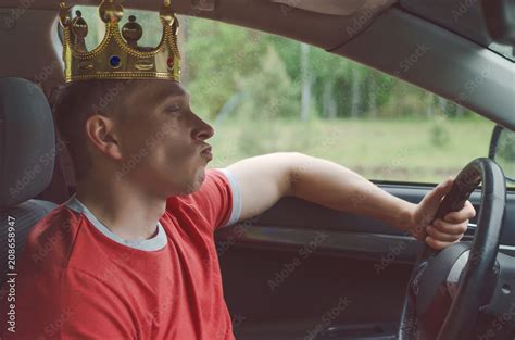 arrogant driver man with golden crown above his head disdainful and boorish attitude on the