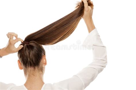 Woman Tying Her Hair Stock Photo Image Of Portrait