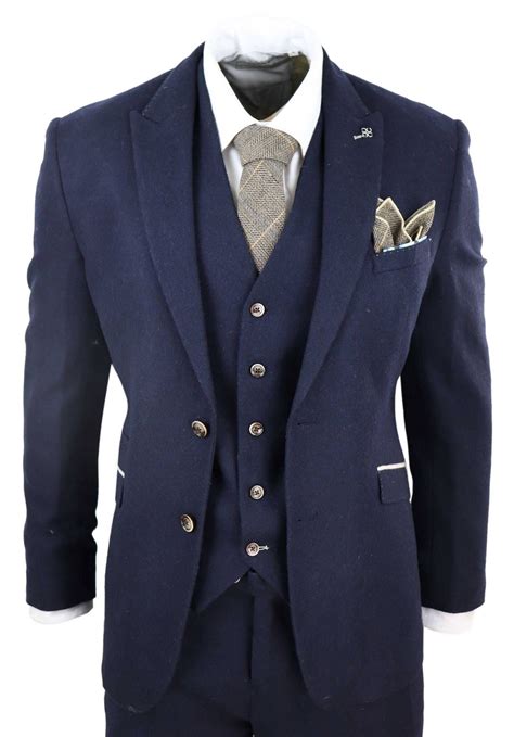 Wedding suits, sport coats, blazers, custom pants, men's custom dress shirts, formal wear, three piece suits, double breasted suits, plaid suits boasting an elegant dion blue, this herringbone suit features opulent gold trims and a subtle heritage check. Mens Navy-Blue 3 Piece Vintage Suit | Happy Gentleman