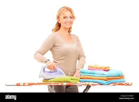 Mature Woman Ironing Clothes Stock Photo Alamy