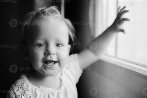 Portrait Of Happy One Year Old Girl In Black And White 27845952 Stock