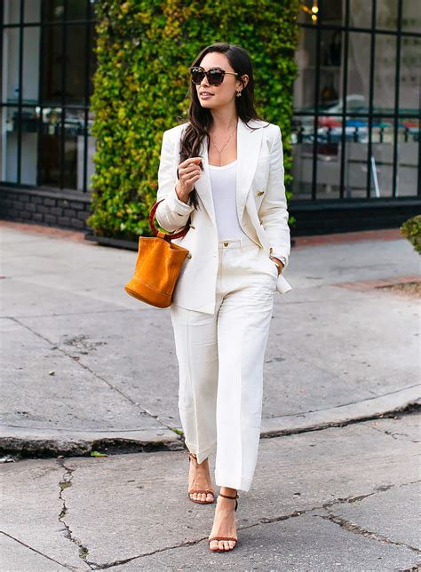 sydne style shows how to wear a pant suit for summer with inspiration from fashion blogger with
