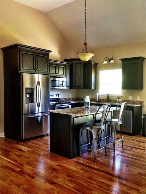 Gallery featuring images of 34 kitchens with dark wood floors. black kitchen cabinets with dark wood floors - Google ...