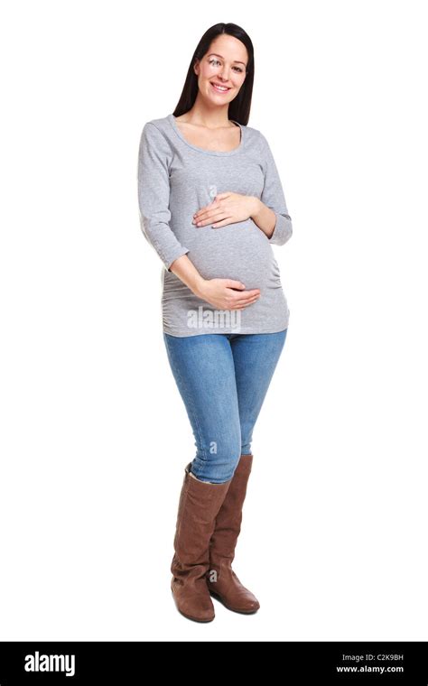 Photo Of An Attractive Brunette Woman Who Is 32 Weeks Pregnant Isolated On A White Background