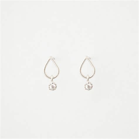Stud Earrings With A Dangle Diamond Moonli Designs