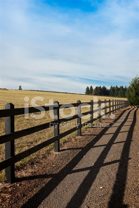 Rail Fence And Country Road Stock Photo Royalty Free Freeimages