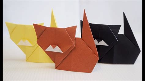 Learn how to make many different origami cat models. Easy Kids Origami Cat Tutorial | Origami cat, Origami easy ...