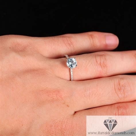 Aquamarine engagement rings available in halo diamond, vintage, solitaire, three stone, classic & other popular styles at best price. Round Cut Aquamarine Diamond Pave Solitaire Engagement ...